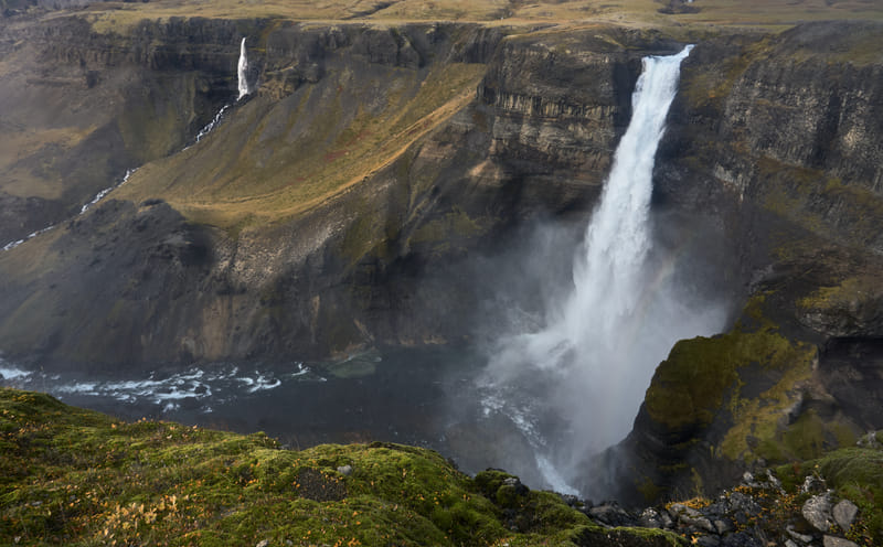 Háifoss tall waterfall in canyon