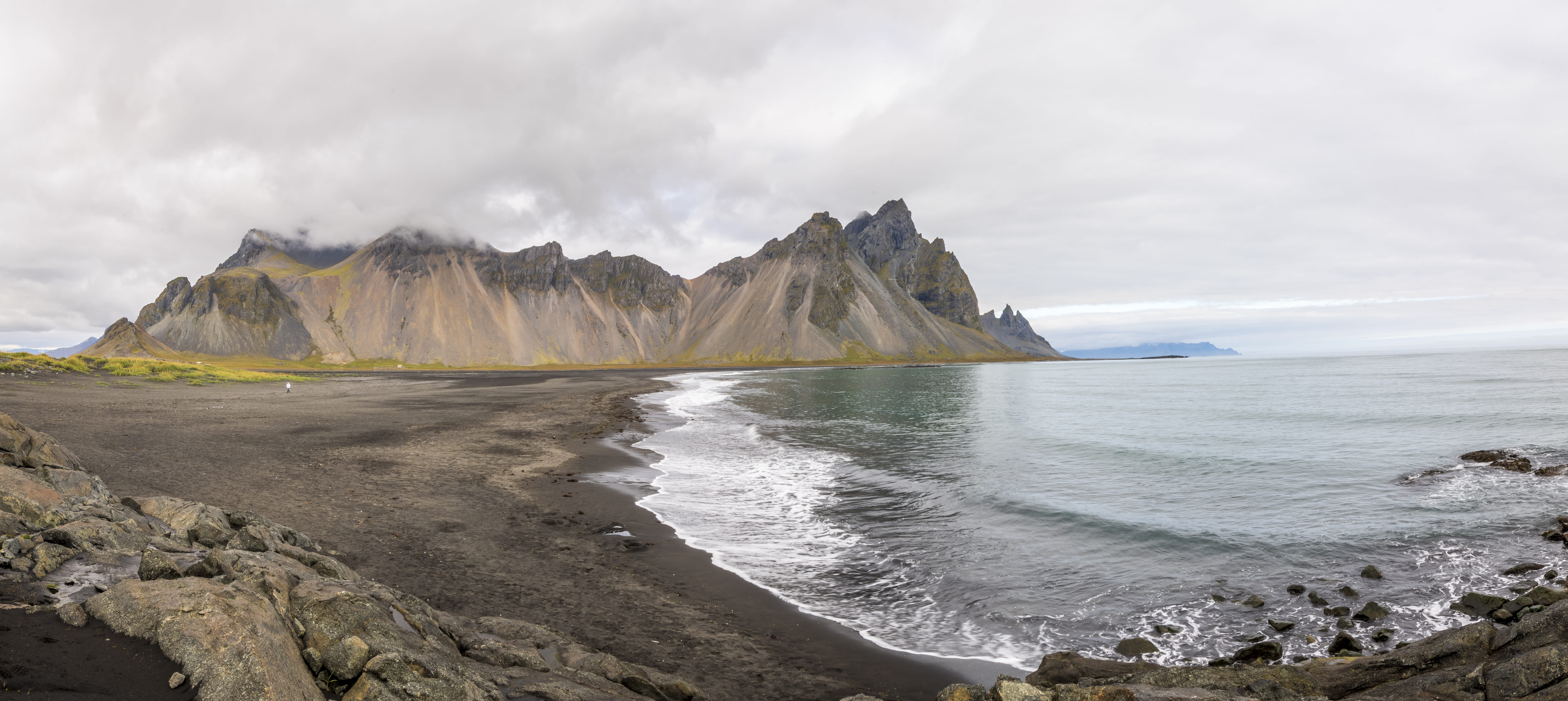 Vesturhorn mountain and black sand dunes on Iceland coastline