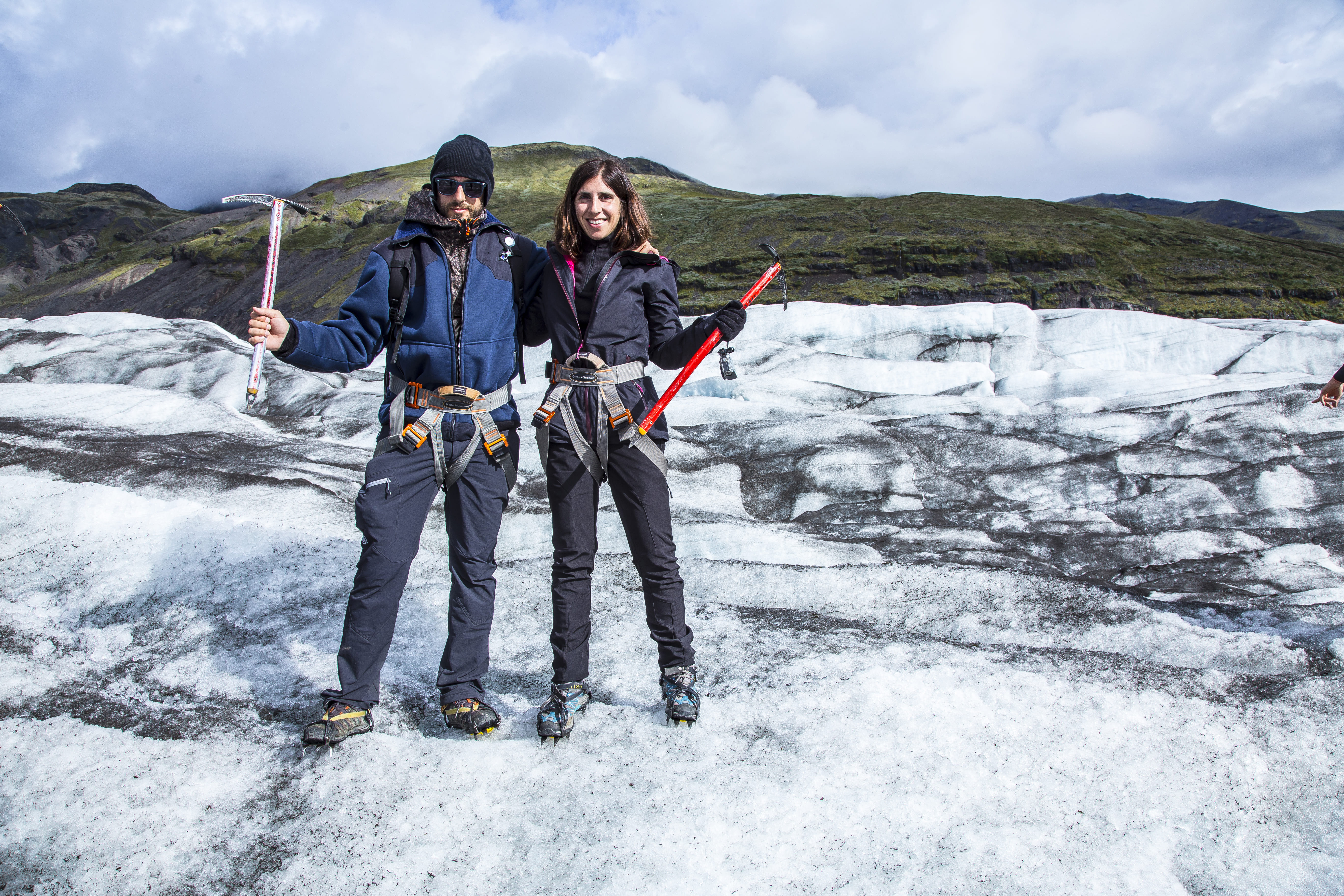 Couple hiking on Svinafellsjokull glacier in Iceland