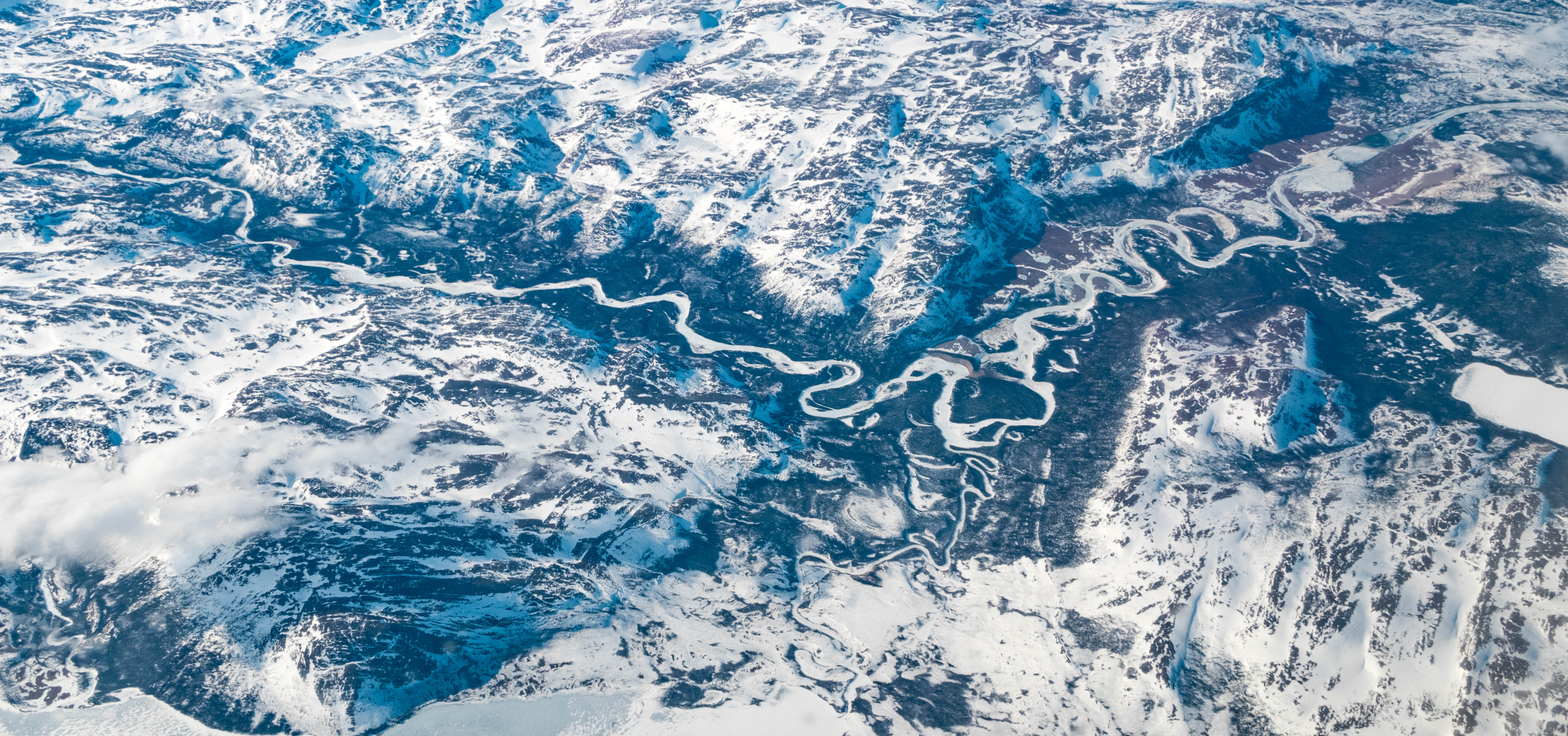 Aerial view of frozen landscape river