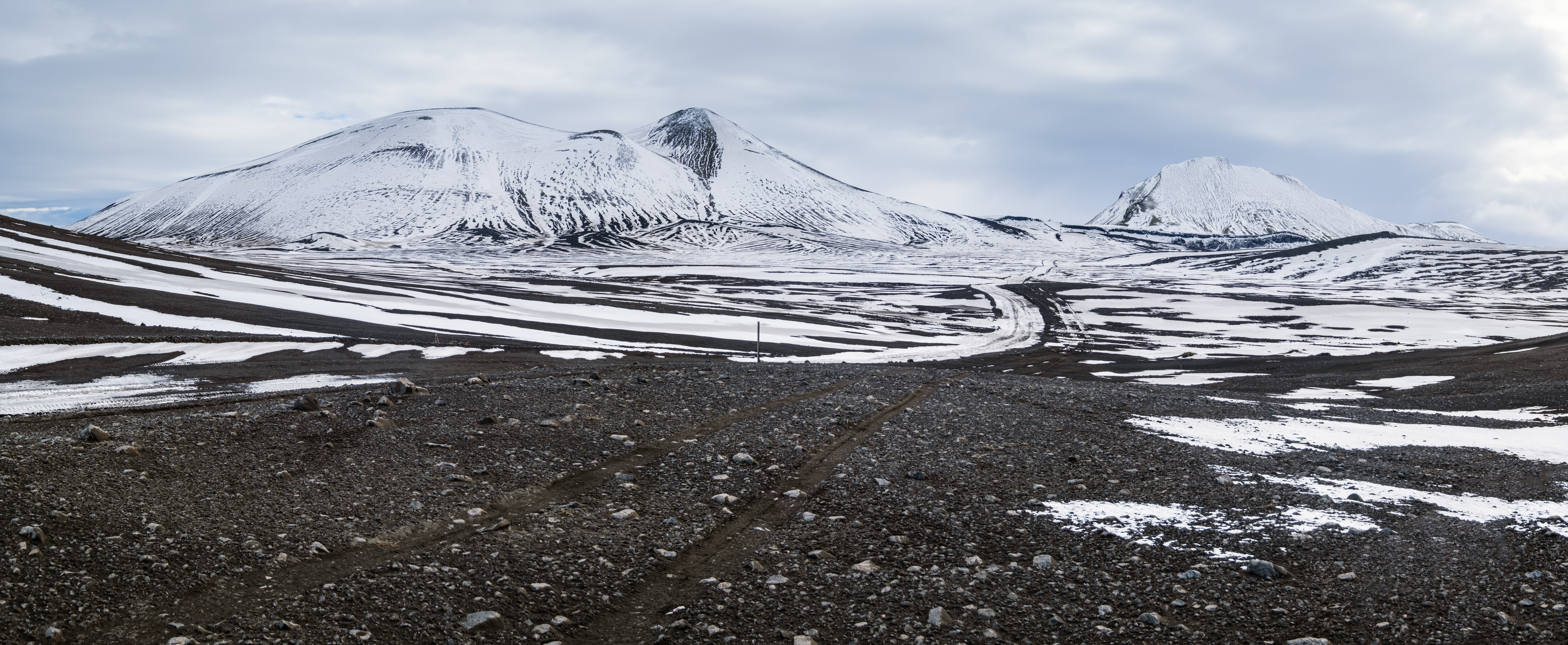 Colorful Landmannalaugar mountains under snow cover in autumn Iceland